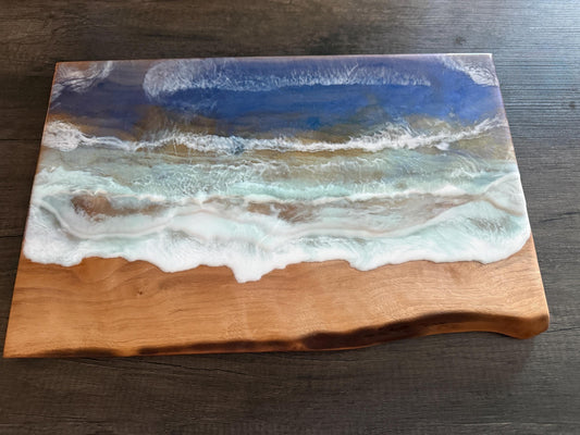 Handcrafted Walnut Charcuterie Board with Live Edge and Ocean Waves Resin Design