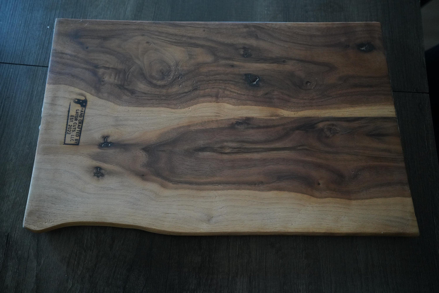 Handcrafted Walnut Charcuterie Board with Live Edge and Ocean Waves Resin Design