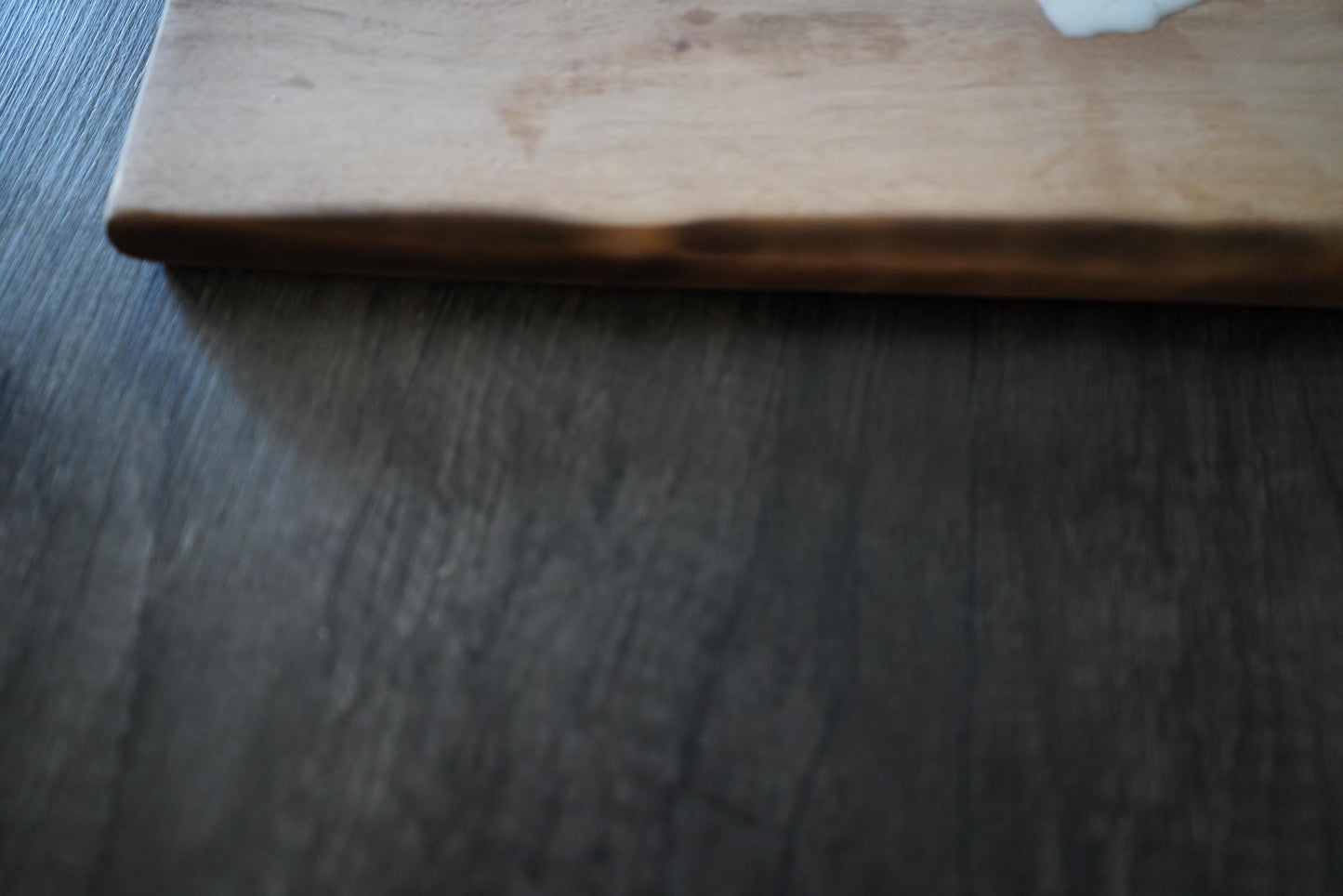 Handcrafted Walnut Charcuterie Board with Live Edge and Ocean Waves Resin Design