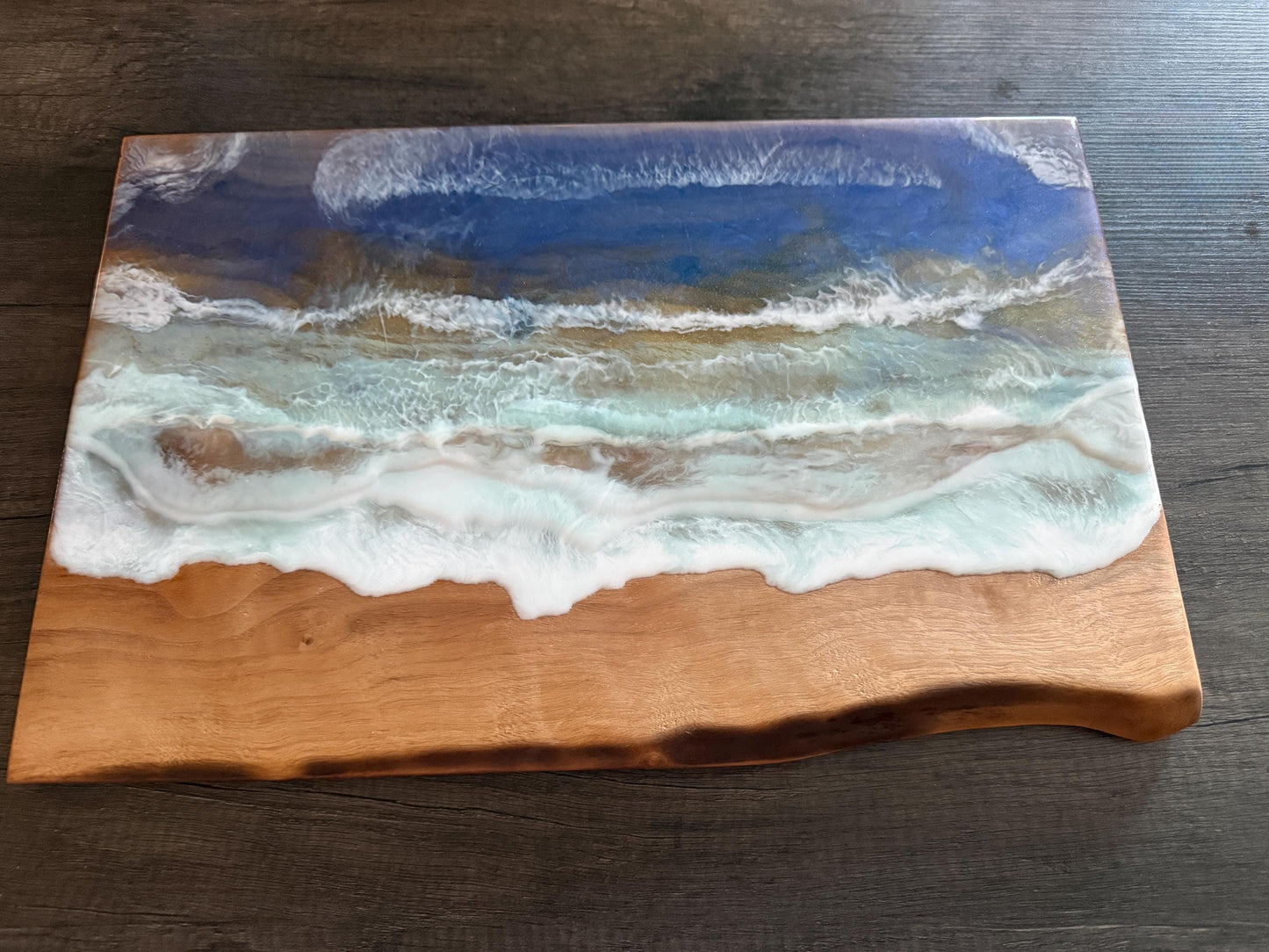 Handcrafted Walnut Charcuterie Board with Live Edge and Ocean Waves Resin Design