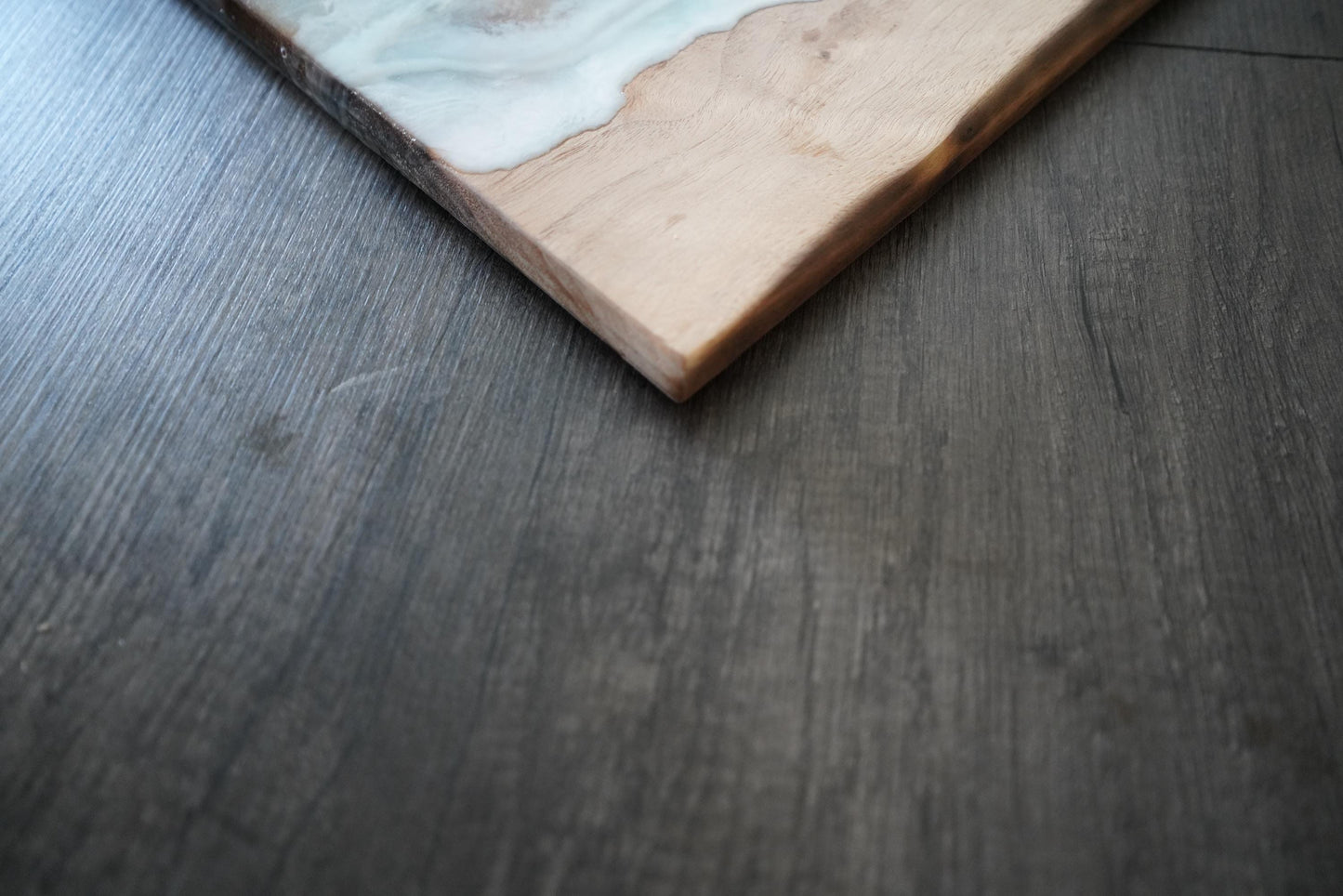 Handcrafted Walnut Charcuterie Board with Live Edge and Ocean Waves Resin Design